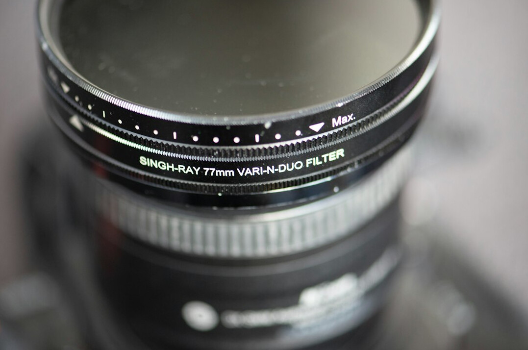 Close-up of a professional video camera lens